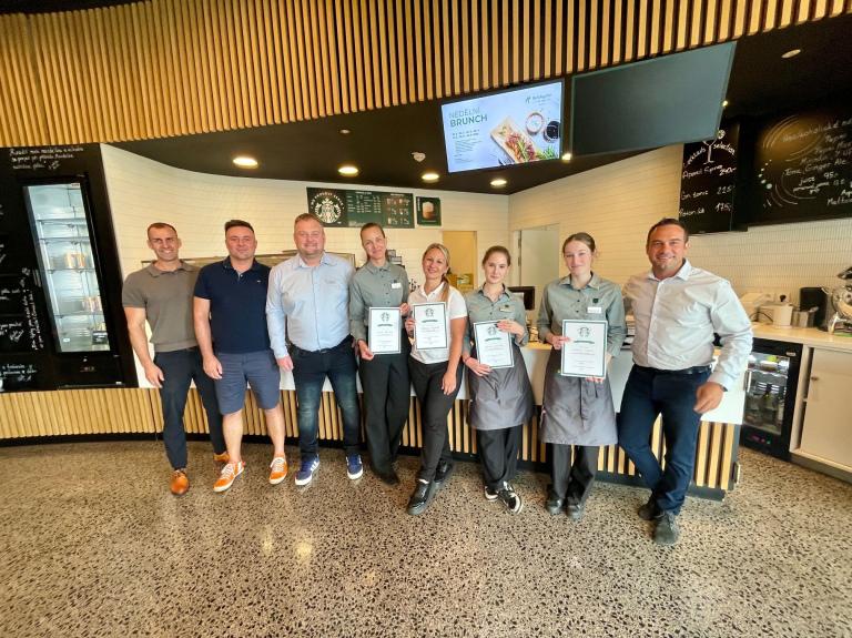 we_proudly_serve_starbucks